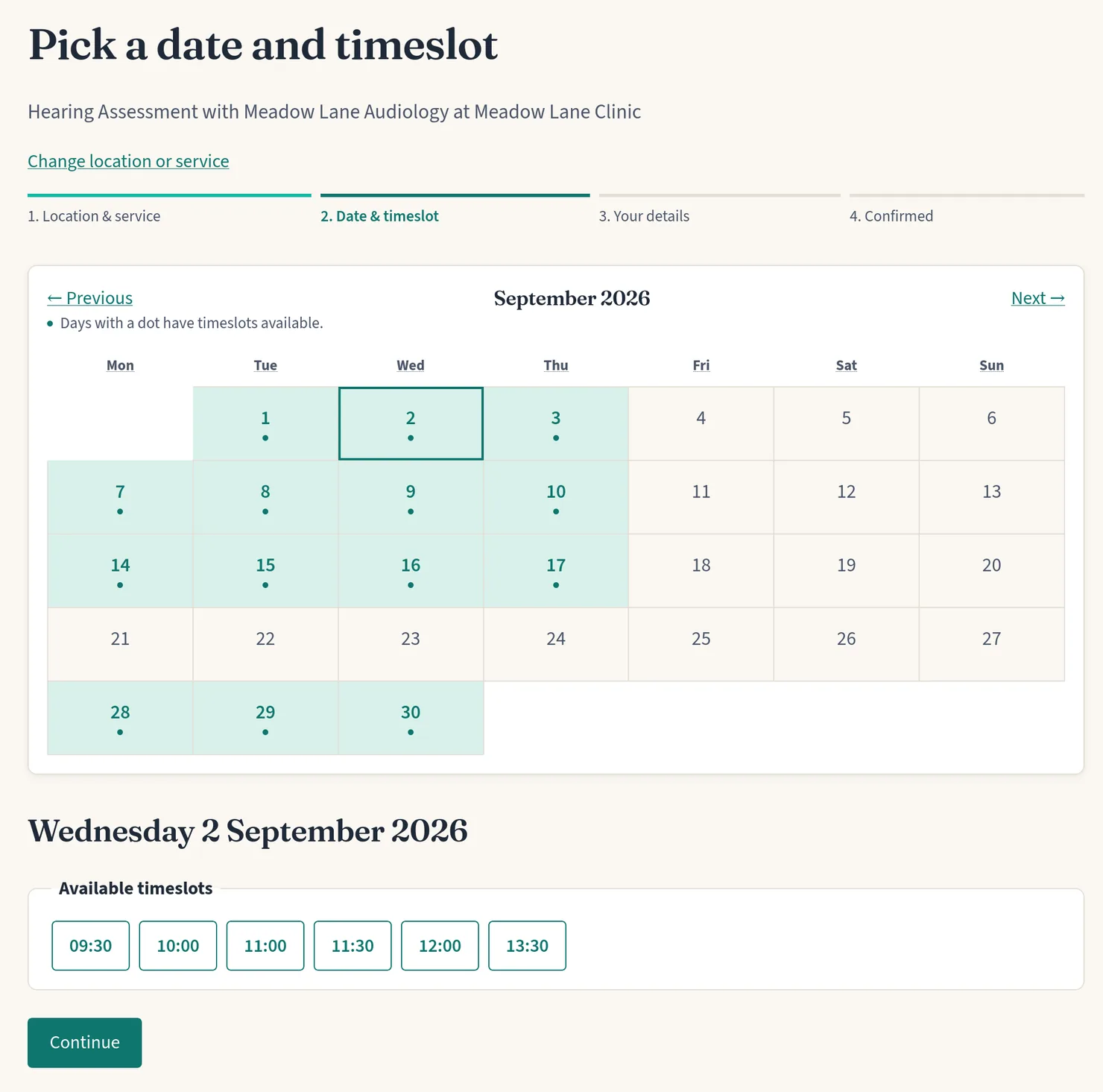 A practitioner's booking page: a month calendar with a dot on each day that has free time, and the free timeslots listed for the day chosen.